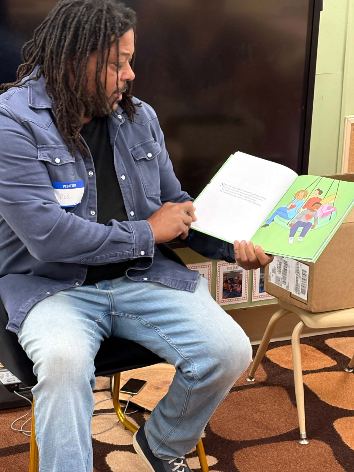 Rod Cornish showing the book's illustrations
